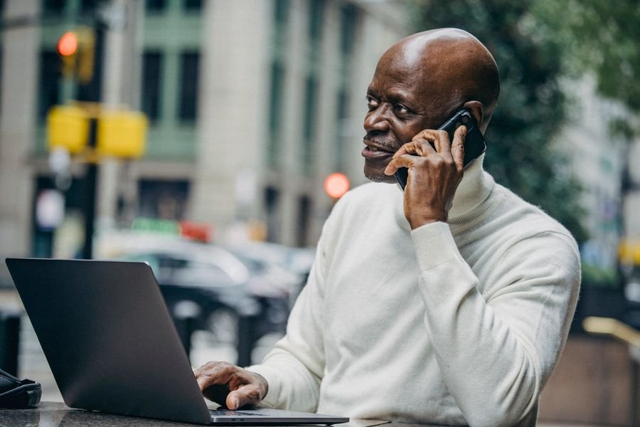 Business professional making a call on a mobile phone